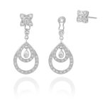 Pendientes Ensemble Pendientes de oro blanco de 18K compuestos de dos partes que nos ofrece una doble versión día-noche con 0,60ct de diamantes talla brillante.