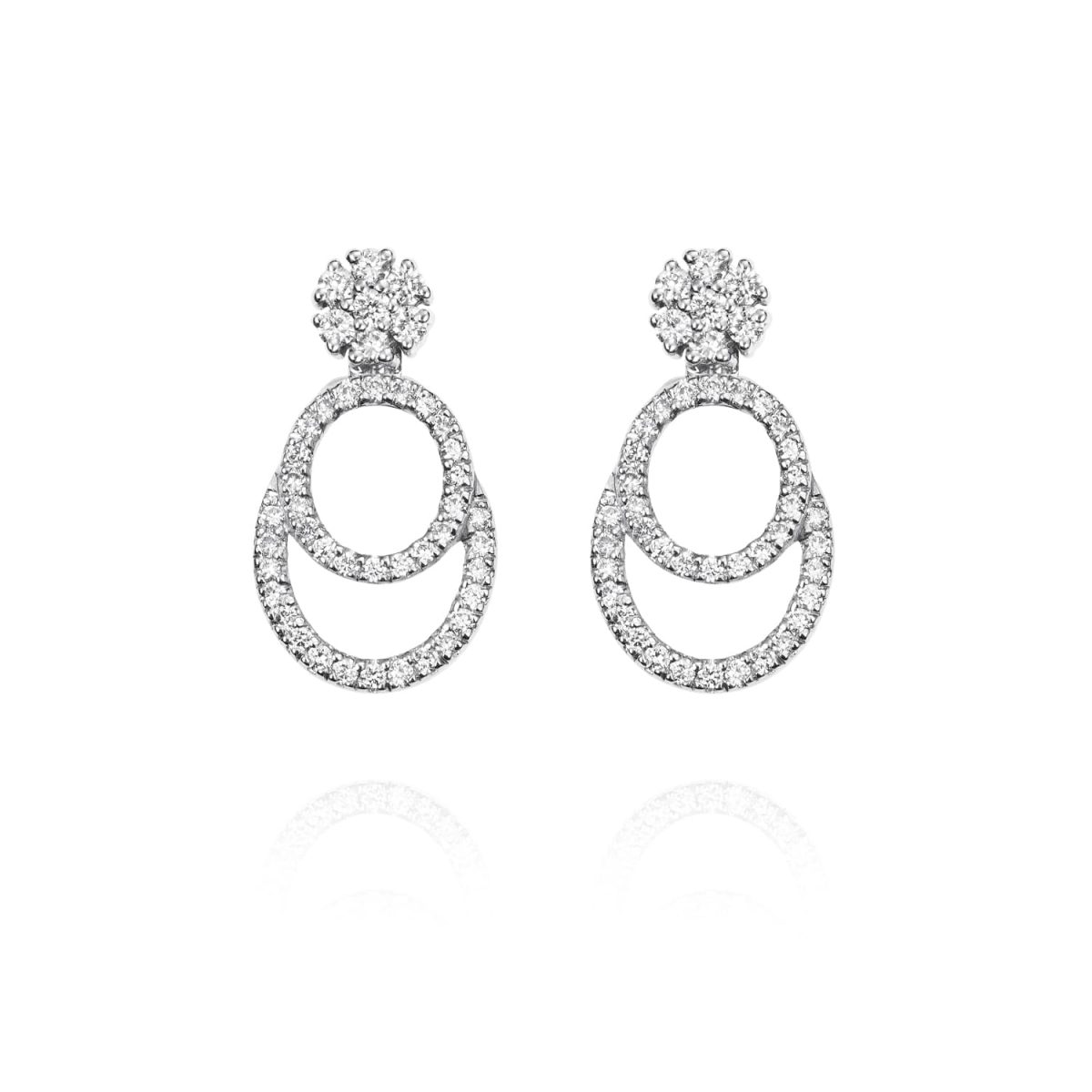 Pendientes NEW ENSEMBLE Pendientes de oro blanco de 18K compuestos de dos partes que nos ofrece una triple versión con 0,53ct de diamantes talla brillante.