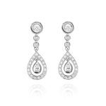Pendientes NEW ENSEMBLE Pendientes de oro blanco de 18K compuestos de dos partes que nos ofrece una doble versión con 0,53ct de diamantes talla brillante.