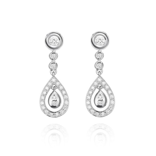 Pendientes NEW ENSEMBLE Pendientes de oro blanco de 18K compuestos de dos partes que nos ofrece una doble versión con 0,53ct de diamantes talla brillante.