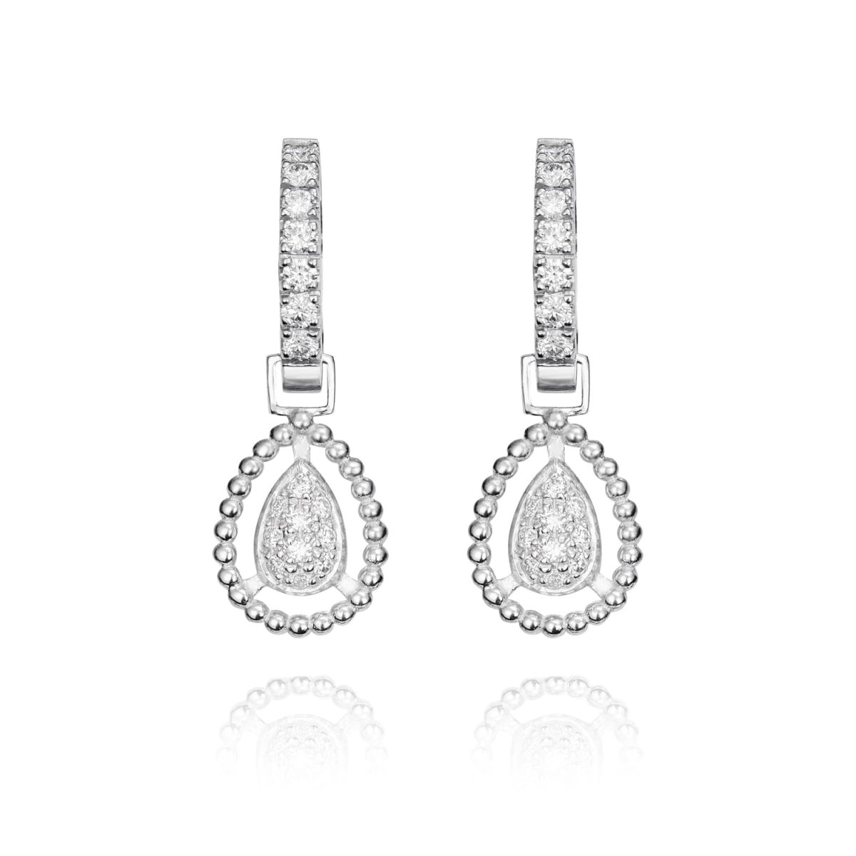 Pendientes NEW ENSEMBLE Pendientes de oro blanco de 18K compuestos de dos partes que nos ofrece una doble versión con 0,57ct de diamantes talla brillante.