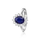 Anillo Colour Anillo de oro blanco de 18K con un zafiro natural de 1,52ct talla oval adornado con 0,53ct de diamantes talla brillante.