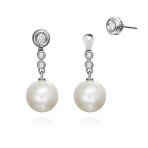 Pendientes New PEARL - GAYUBO — Home Of Classic Jewelry Pendientes de oro blanco de 18K, compuestos de dos partes que nos ofrecen una doble versión, adornados con 0,21ct de diamantes talla brillante y una pareja de perlas cultivadas.